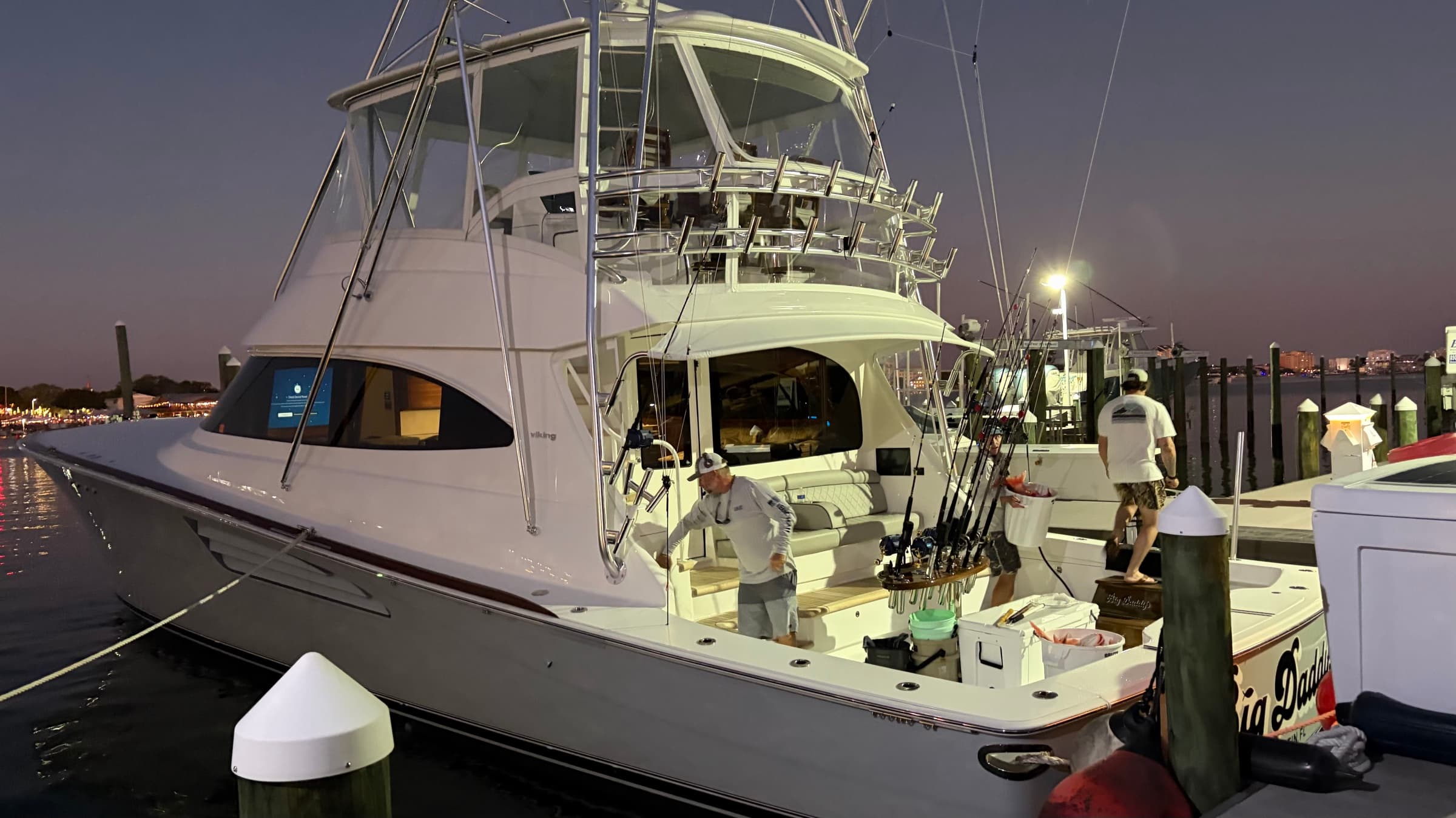 Big Daddy's at the dock at twilight, golden interior lit
